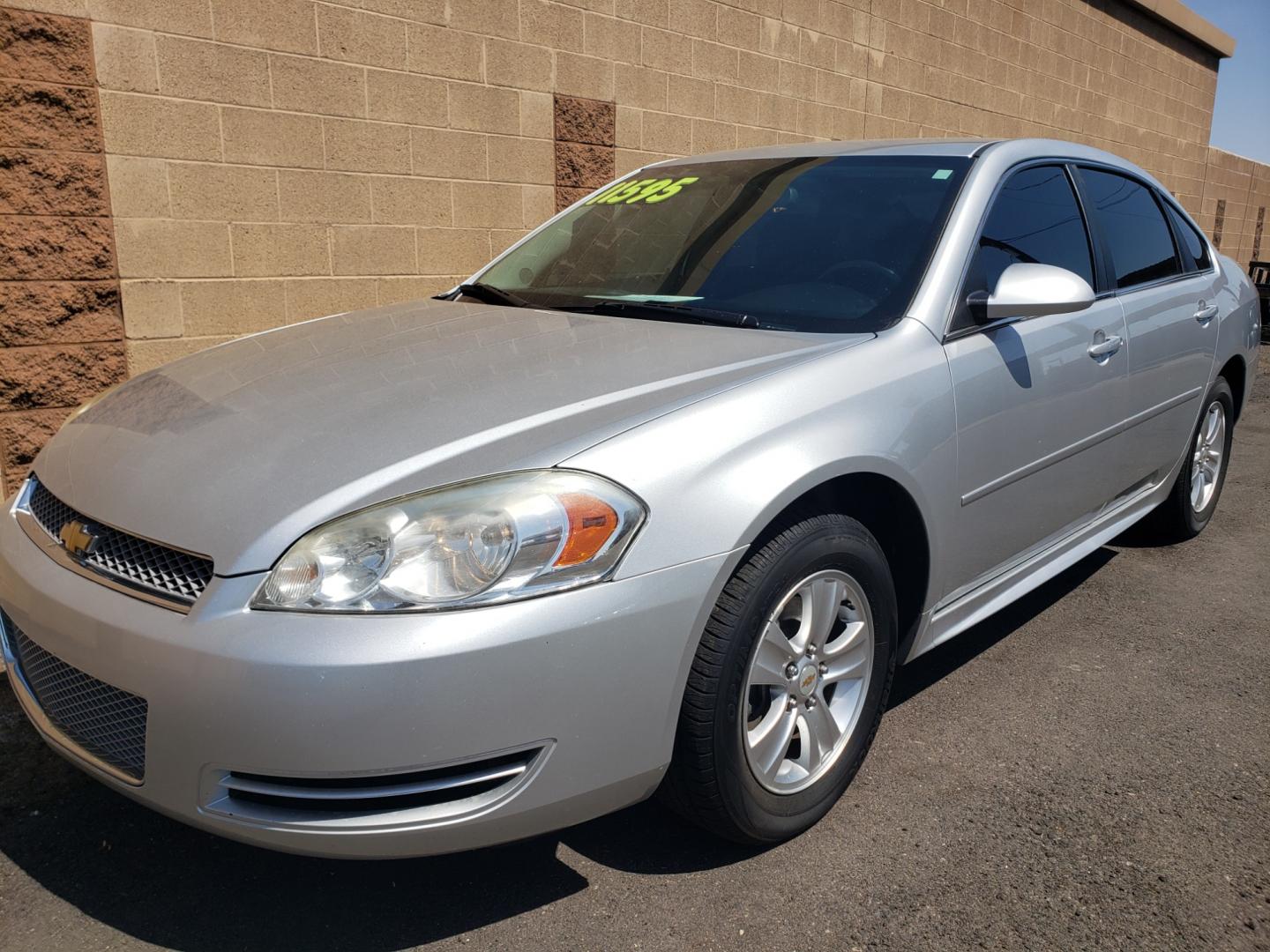 2013 silver /gray and black Chevrolet Impala LS (2G1WA5E32D1) with an 3.6L V6 DOHC 16V FFV engine, 6-Speed Automatic transmission, located at 323 E Dunlap Ave., Phoenix, AZ, 85020, (602) 331-9000, 33.567677, -112.069000 - 2013 Chevrolet Impala LS, EXCELLENT condition, A Real Must See!!.... No accidents, Power everything, Ice cold ac, Gray and Black interior with gary cloth seats in near perfect condition, power windows, power door locks, clean Arizona title, Runs and Drives Excellent. Very clean inside and out, Any q - Photo#0